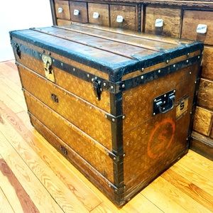 A GRAPHITE DAMIER CANVAS COURRIER 110 STEAMER TRUNK WITH SILVER